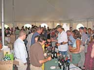A good crowd sampling wine in the tent