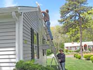 Washing pine pitch off my parents house on Cape Cod.