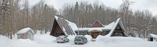 Birch Ridge Inn surrounded by snow drifts