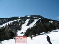 Oxymoron-Walter and a Slow Sign with Killington Peak in the background.
