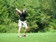 Driving the ball on hole 12 at Green Mountain National Golf Course.