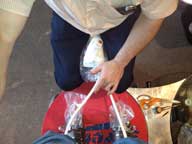 New ski boots being injected with foam at Surefoot.