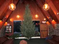 The 2011 Birch Ridge Inn Christmas Tree standing in the Great Room waiting to be decorated.