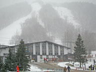 Heavy snow falling around the K1 Base Lodge at Killington