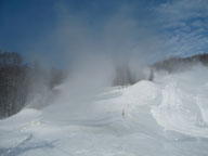 Snow guns burying Lower Skyburst in man-made blizzard