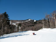 Sky Peak, covered in snow, bathed in brilliant sunshine.