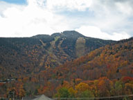 Light snow compliments fall foliage on Killington Peak