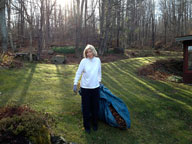 Mary moving a load of leaves at the Birch Ridge Inn