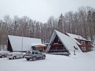 Fresh snow drapes the Birch Ridge Inn