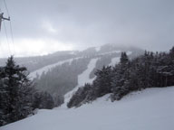 An icy Northwest wind pushes a snow squall across Killington Peak Tuesday afternoon.
