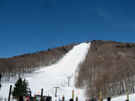 Outer Limits at Bear Mountain at Killington lit up by sunshine.