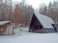 Snow covers the ground at the Birch Ridge Inn, Killington VT
