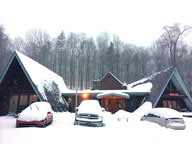 Heavy snow drapes the Birch Ridge Inn.