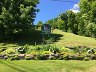 The open flags are flying at the Birch Ridge Inn