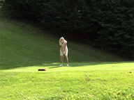 Mary teeing off on the 7th hole at Green Mountain National Golf Course