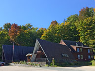 caption=Colors becoming vibrant in the tree canopy around the Birch Ridge Inn.