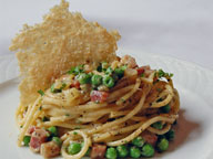 Bucatini carbonara with pancetta, asiago crisp, cracked pepper, gremolata