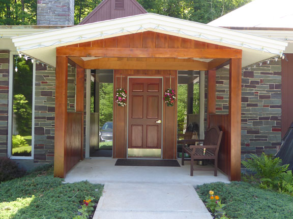 The front portico entrance to the Birch Ridge Inn before repairs.