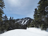 Killington Peak bathed in sunlight and snow.