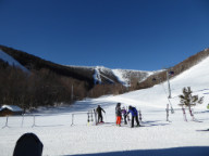 Killington Peak in the background as todays group gets ready to journey out.  Notice the 