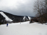 Foreboding clouds descend on Killington as Chuckles skates in front of K1 on way to Bubble